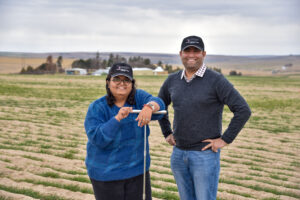 Photo of Surendra Singh and his wife Shikha in a field