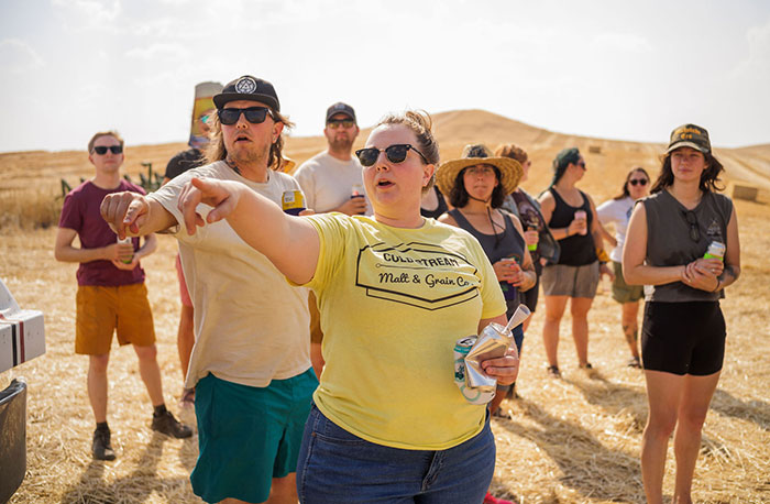 Rachel Verhay-Goicoechea (front), director of relations for Cold Stream Malt, shares the views of the Horlacher family's fields near Tekoa, Wash., with participating brewers