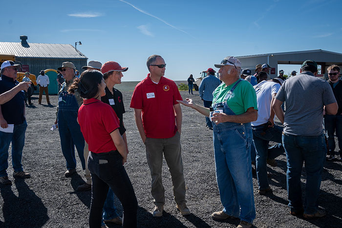 Arron Carter talking with growers