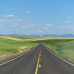 Adobe Stock photo-Road surrounded by Wheat Field in Washington State