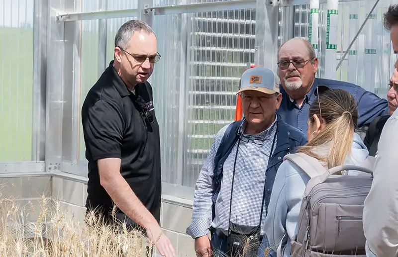 Aquaculture team guiding others and teaching.